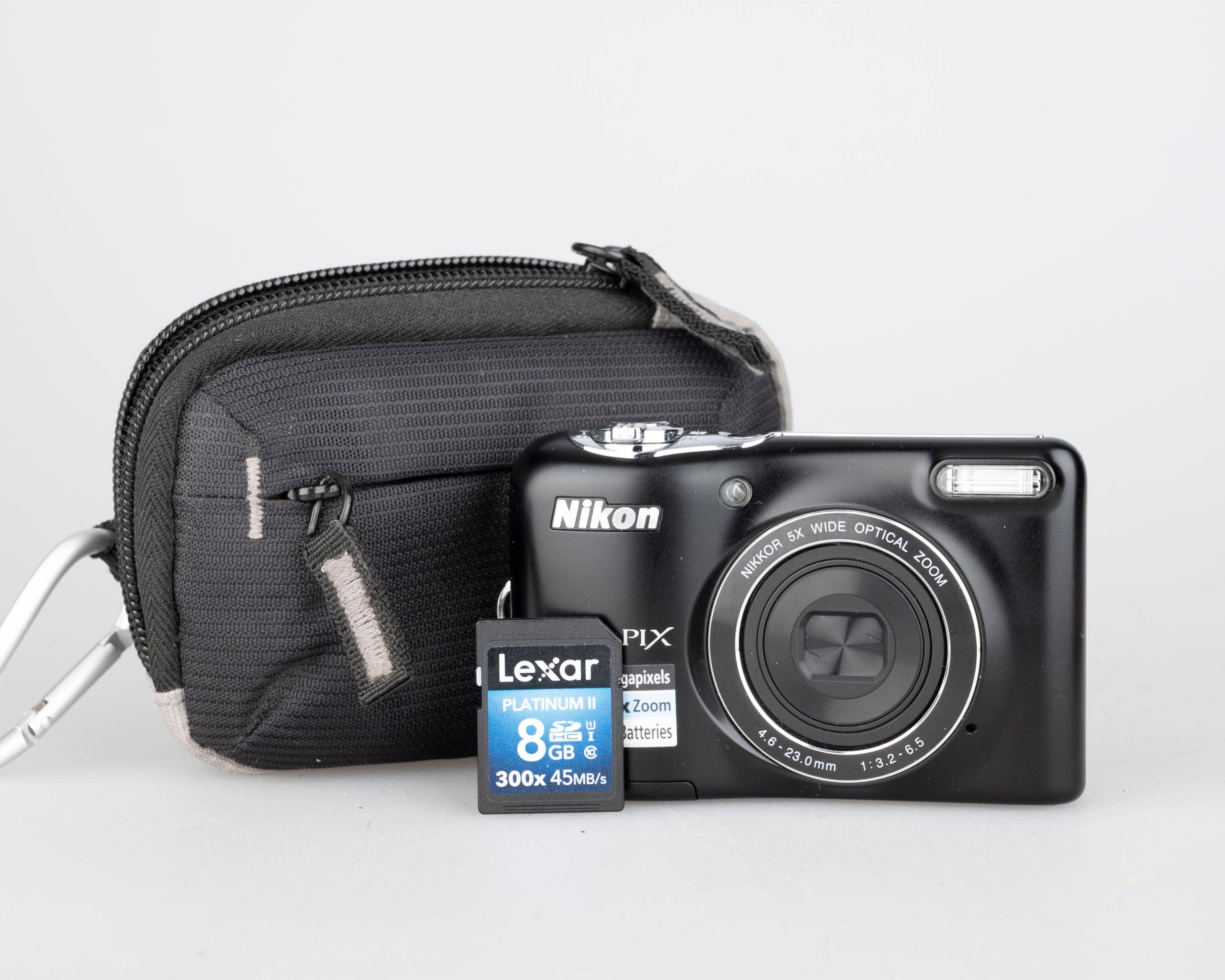 Nikon Coolpix L32 20.1 MP CCD sensor digicam w/ 8GB SD card + case