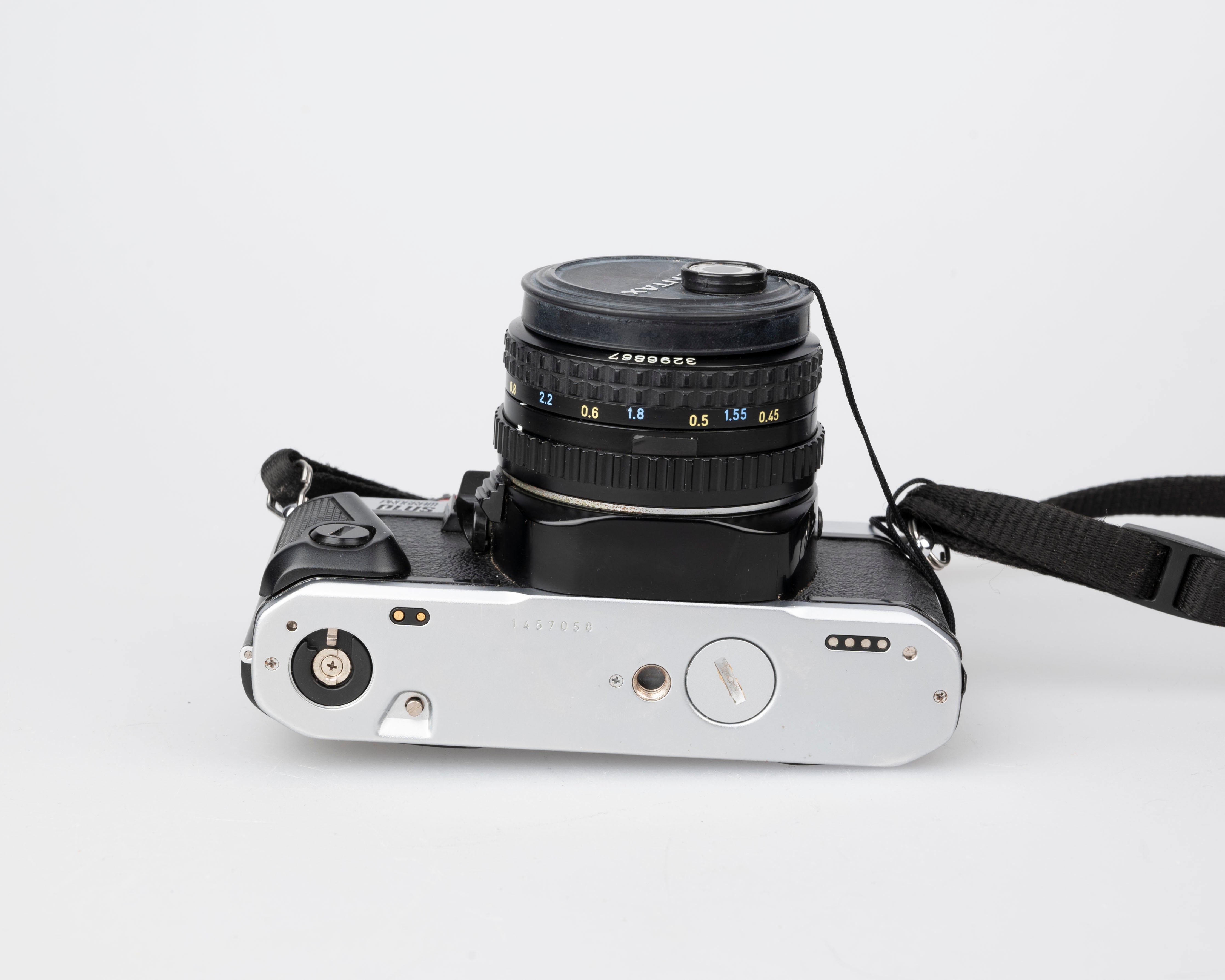 Pentax Program Plus 35mm film SLR w/ 50mm f2 lens + ever-ready 