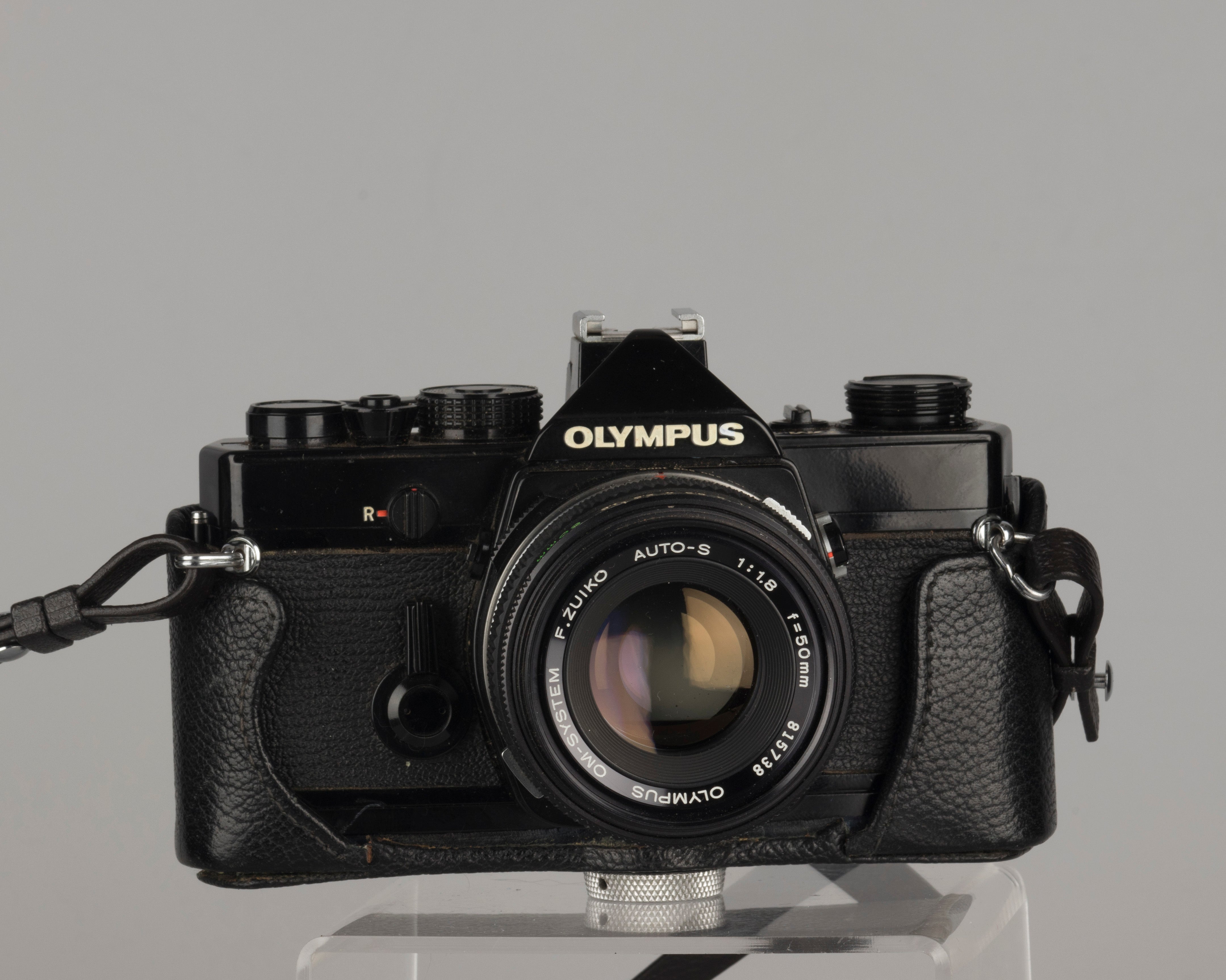 Olympus OM-1 35mm film SLR w/ Zuiko 50mm f1.8 lens and ever-ready 