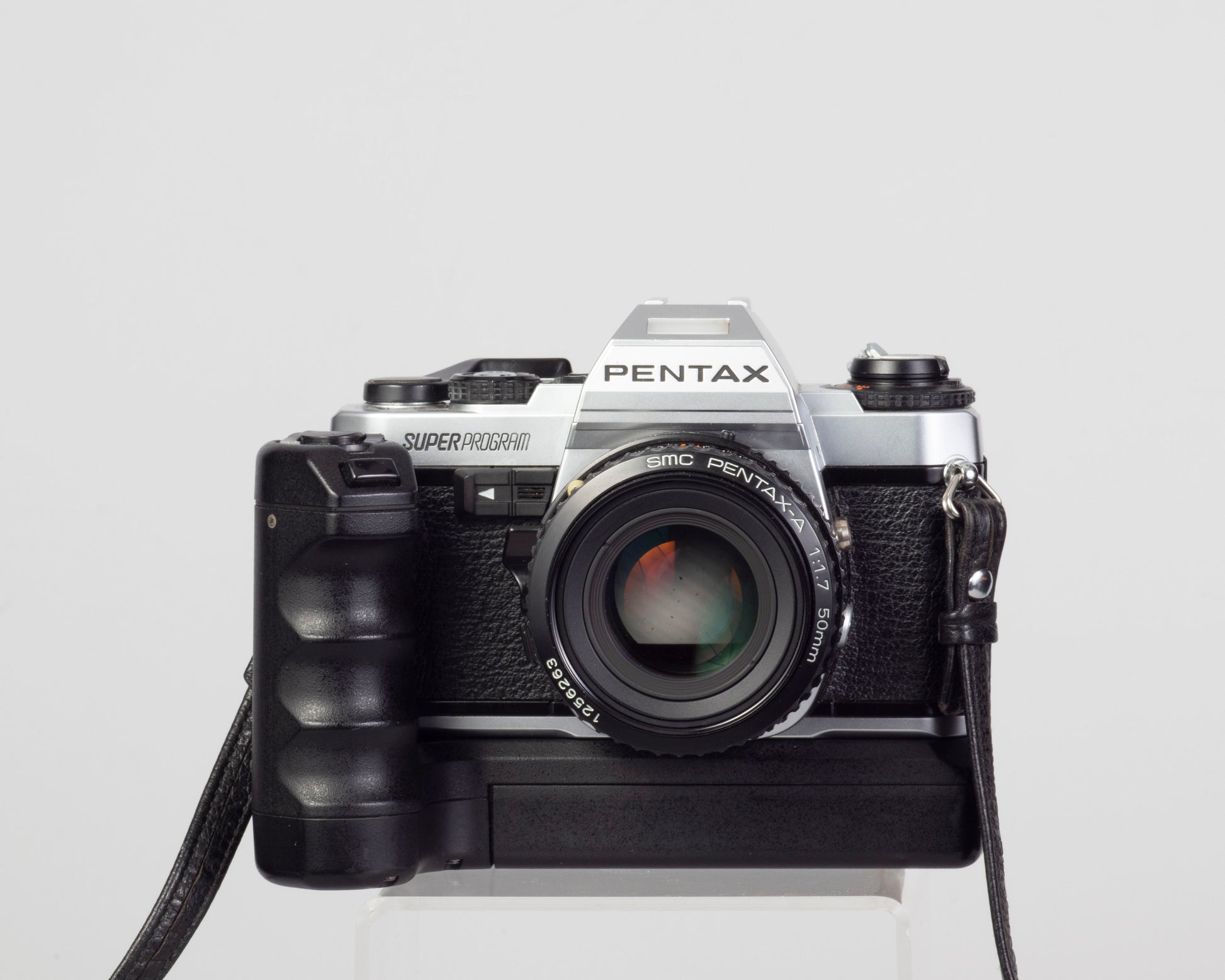 Pentax Super film SLR w/ Pentax A 50mm f1.7 lens + – New Wave Pool